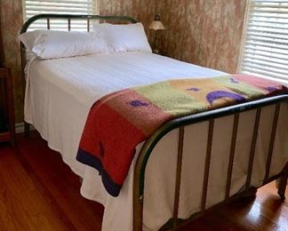 Vintage full size cast iron bed w/hand-painted floral design on both the headboard and footboard