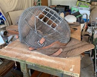 Vintage Baseball catchers mask- love to see this hanging out of doors with plant in it