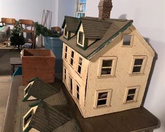 antique doll house in basement in need of much TLC