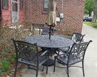 25-Heavy duty patio table and chairs.