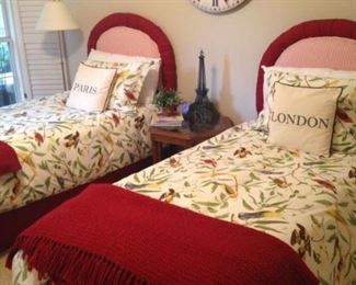 Twin beds with darling custom headboards and bedding