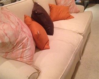 White sofa and decorative pillows