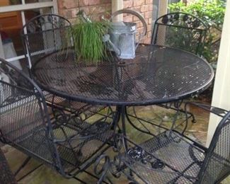 Black round table & 4 spring chairs