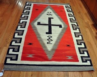 Chagato diamond look, possible 1920s, 72" by 40", transition from blanket to rug; twirling log paths of life meeting and spinning; Navajo colors; custom rug