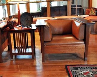 One of 2 Stickley Prairie Spindle arm chairs in solid cherry with leather
