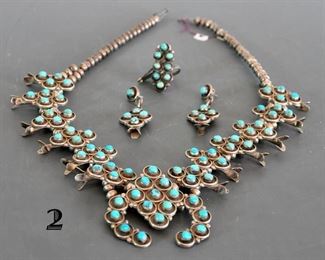 Zuni Squash Blossom shown with earrings and ring that match in style - Naja with 17 stones - Lupe Iule - necklace is 118 grams. - Sold at preview.