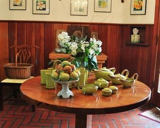 View of kitchen with part of the Brock of California dinnerware. Client is keeping the round table until house sells but it can be purchased for later pick up.