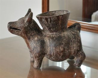 There are a number of Pre Columbian pieces and look a likes on our website
