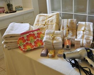 Well cared for linens in master bath and walk in cedar closet