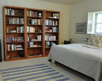 Oak bookcase unit - there is a 6' by 8' Pottery Barn Dhurrie on the floor.