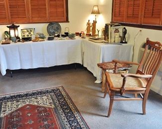 View of room of kitchen with many nice items including a pair of redone antique oak arm chairs and a nice older Turkish rug