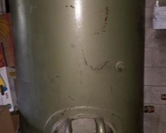 8' tall water tank in the back room used here at the old laundromat facility. Buyer responsible for removal. Lots of large copper pipes attached.