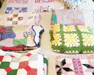 Several vintage QUILTS