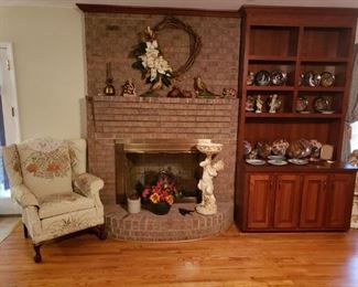 Large cabinet not for sale (built-in)
Collector plates...Wing Back chair