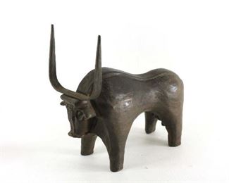 carved wood ox with metal horns