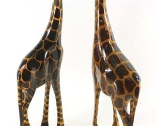 2 carved wood giraffes