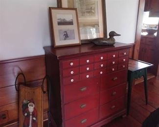 Multi drawer unit in red paint, well built in a classic style
