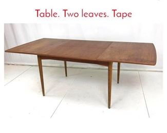 Lot 904 Danish Modern Teak Dining Table. Two leaves. Tape