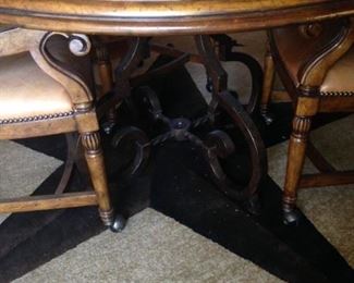 Very sturdy base; good-looking carving on each leg