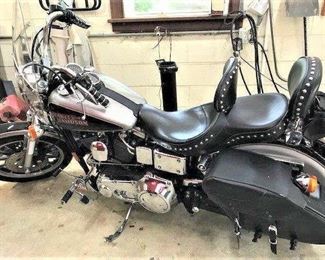 Motorcycle - 1996 Harley Davidson Dyna Low Rider. Added features include windshield, upgraded Corbin  seats. Saddlebags.  Mileage 32,161.  Taking reasonable offers.