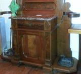 San Francisco Company Eastlake style hall tree with mirror (not shown) granite top, cast iron inserts in umbrella base