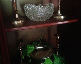 Brass and silver plate candle holders; crystal bowl