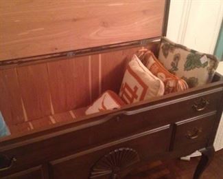 Blanket chest - opens from the top; University of Texas pillows