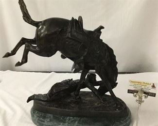 Lot 100 - Frederic Remington cast bronze sculpture of horse with fallen rider - as is some wear