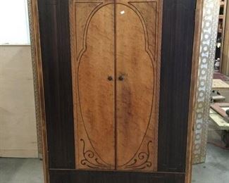 Lot 324 - Antique mahogany and burled maple art deco wardrobe on caster with beautiful carving