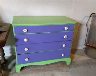 Chartreuse and purple painted dresser