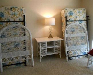 wicker twin beds, wicker table, lamp