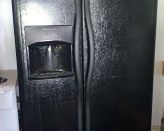 Side by Side Black Frigidaire Refrigerator