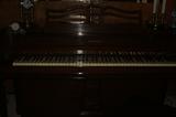 Acrosonic Piano by Baldwin (sorry picture is so dark)