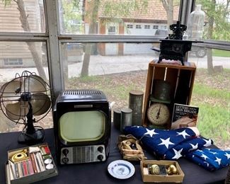 Antique fan, 1950's television set,  WW2 Flight oxygen bottle.