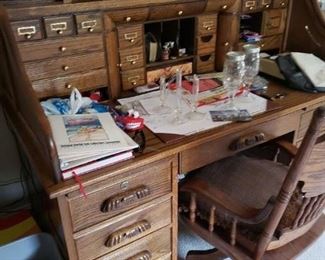 Medium Side Roll Top Desk with lots of drawers. Roller Chair. 