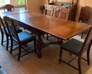 Antique Carved Oak French Dining table w/6 Chairs	31x40x64in (extends 112in) HxWxD