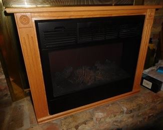 Portable fireplace log heater