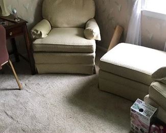 upholstered chair and ottoman