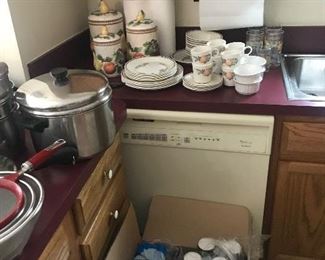 canisters, dishes, pots and pans, and other kitchen items