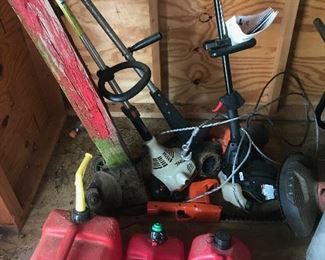 gas cans and yard tools