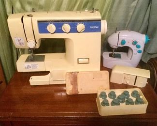 Left To Right:  Brothers Sewing Machine:  $27.00 (SOLD).  Zig Zag Stitch Machine:  $9.00 (new in Box)  Vintage Singer Sewing Box w/Attachments:  $7.50