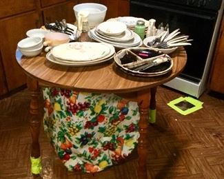 Round Kitchen Table (30"h x 35"d w/a 12" leaf). $45.00
~Yellow Tape On Tne Legs Is To
Help You Avoid Catching Your Foot~