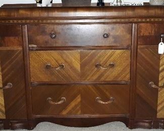 Dresser or Buffet with two side doors that swing open and 3 middle drawers