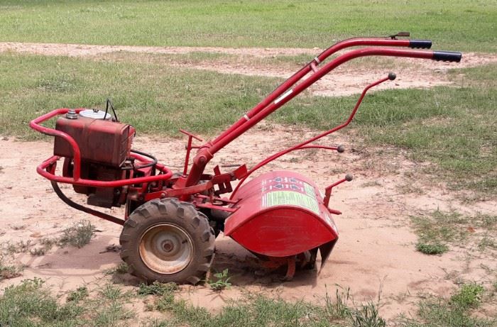 8hp Brigss & Stratton, new electronic coil, tuned-up, runs good, tills good.