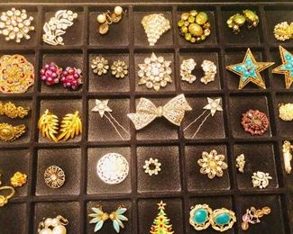 Large Lot of  Vintage Costume Jewelry. Some marked Weiss . No stones missing. 