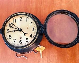 WW11 era Chelsea Nautical Ships Clock with key in working condition . 