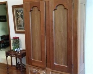 A closer look at the antique armoire, which can be configured for a TV cabinet