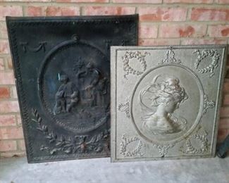 Two cast iron fireplace covers