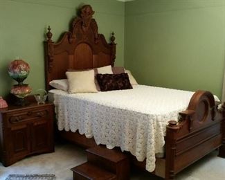 This impressive antique bed has extensions added so it will accommodate a queen size mattress, which is in excellent condition.