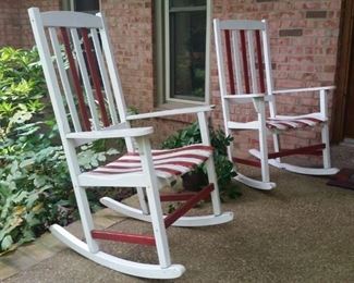 Pair of large white and red painted rocking chairs